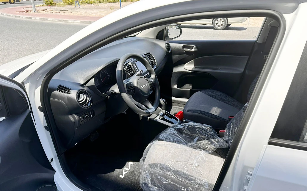 Kia Pegas 2024 White 1